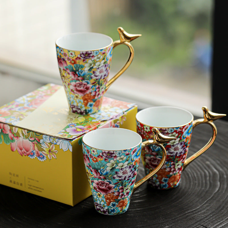 Golden Bird Handle Floral Porcelain Mug – Enamel Glaze Edition