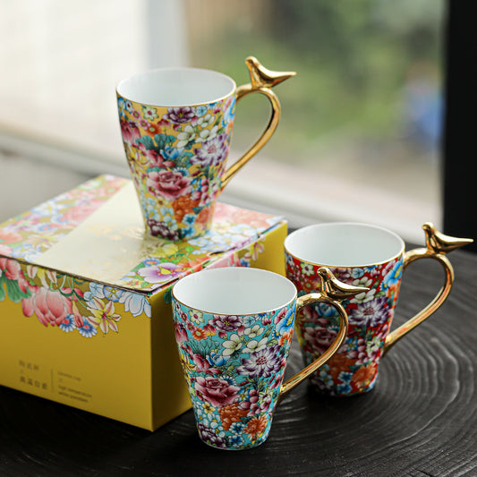 Golden Bird Handle Floral Porcelain Mug – Enamel Glaze Edition