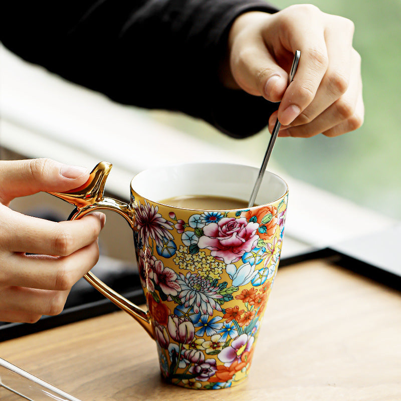 Golden Bird Handle Floral Porcelain Mug – Enamel Glaze Edition