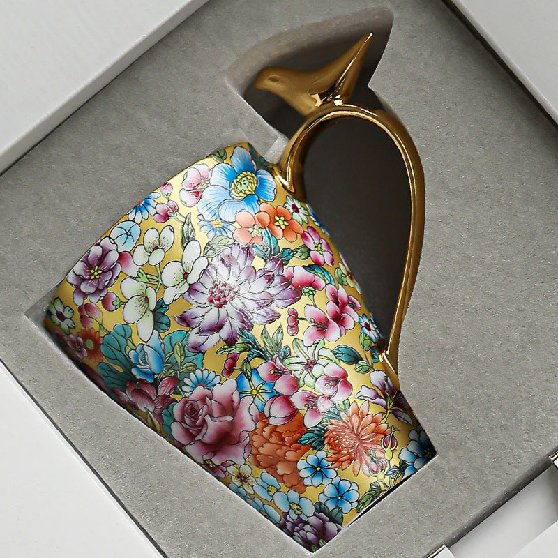 Golden Bird Handle Floral Porcelain Mug – Enamel Glaze Edition