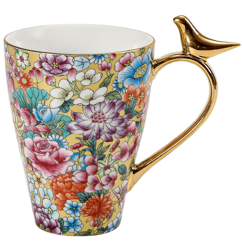Golden Bird Handle Floral Porcelain Mug – Enamel Glaze Edition